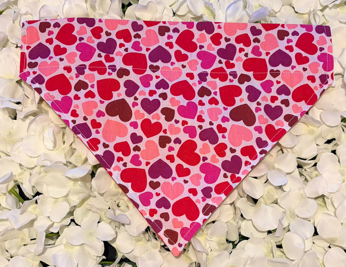 Hearts print dog bandana in pink, red and purple