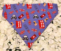 Purple dog bandana with London icons - buses, taxis, Big Ben, Union Jacks - on white petals
